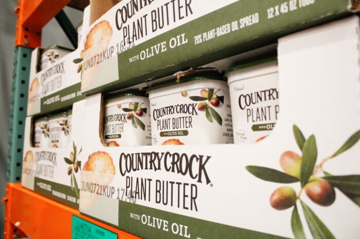 A view of several containers of Country Crock plant butter,