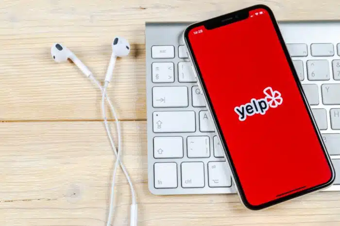 Yelp application icon on Apple iPhone X screen