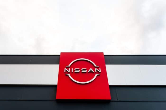 Nissan Motors automobile dealership and sign