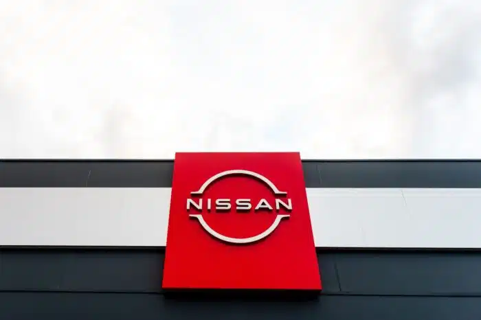Nissan Motors automobile dealership and sign