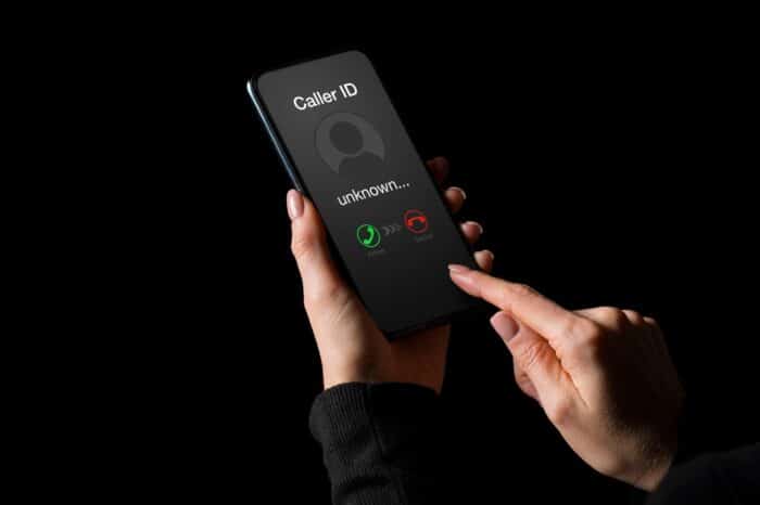 Person getting a call on phone from an unknown number - rash curtis lawsuit