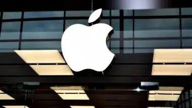 A sign of an Apple company in front of their Toronto store.