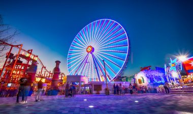 Photo of a Ferris wheel at a theme park.