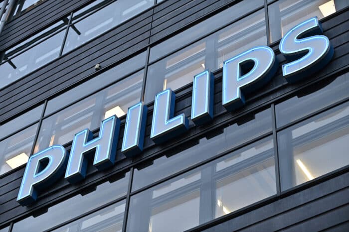 A neon sign for the Dutch electronics manufacturer Philips corporation on the wall of an office building in the Kista business district in Stockholm, Sweden.