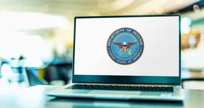Laptop computer displaying logo of The US Department of Defense