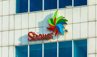 Strauss Group company logo on building.
