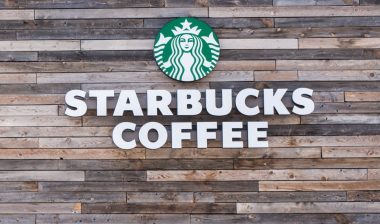 Starbucks coffee sign. Starbucks is the largest coffeehouse in the world.