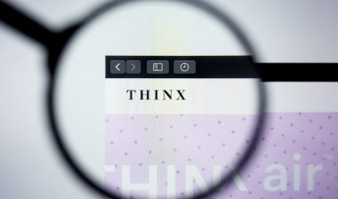 Thinx website homepage. Thinx logo visible on display screen.