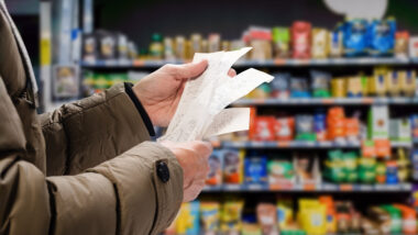 A person checking a receipt