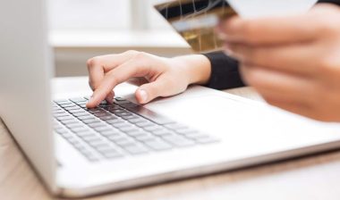 Cropped View of Person Making Online Purchase