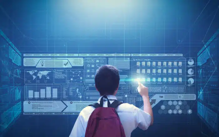 Male school boy student using virtual screen hologram technology - children's data privacy - ftc - data security