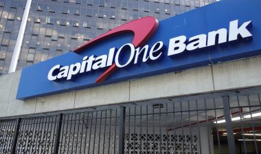 A Capital One Bank sign on the parking garage for the Rego Park Office Tower in Queens.