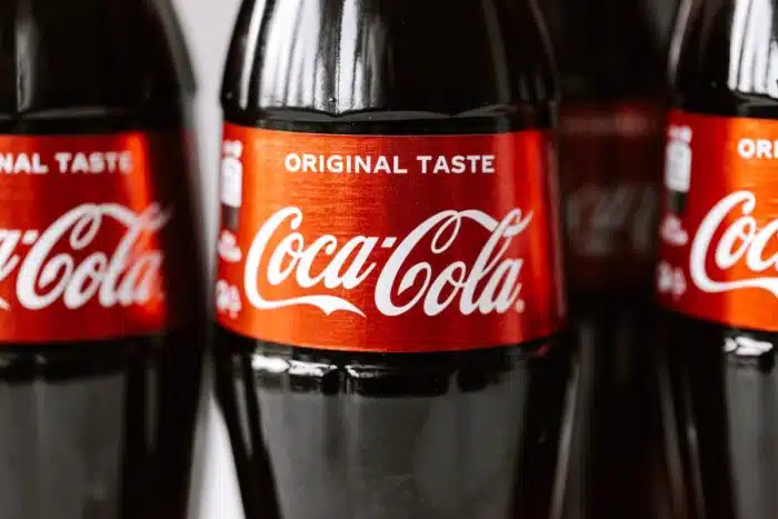 Several refreshing glass coca-cola bottles - rewards program