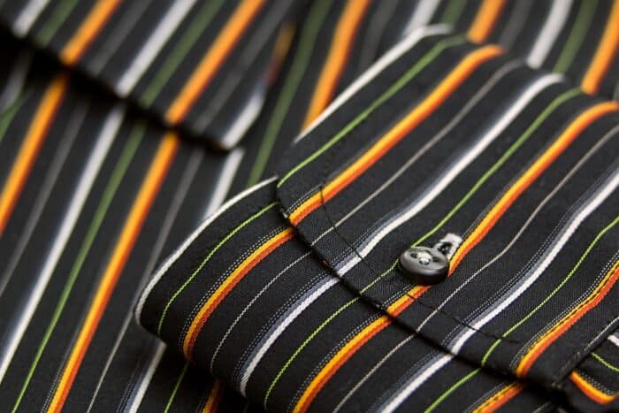 Close up of a men's long sleeve shirt - dungarees class action, website, accessibility