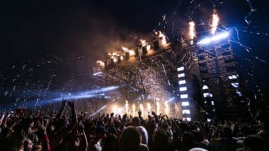 Concertgoers attending a live music show.