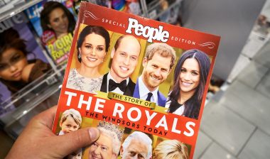 People magazine special edition in a hand.