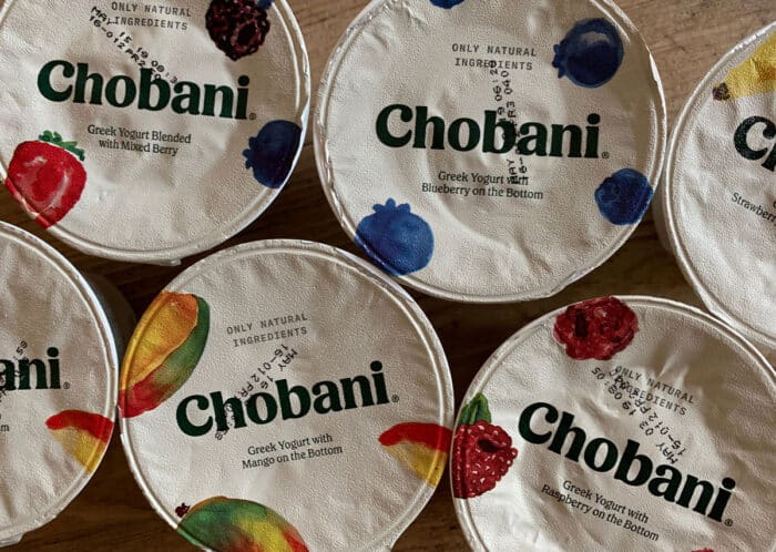 Close up of various Chobani Brand Greek Yogurt Cups.