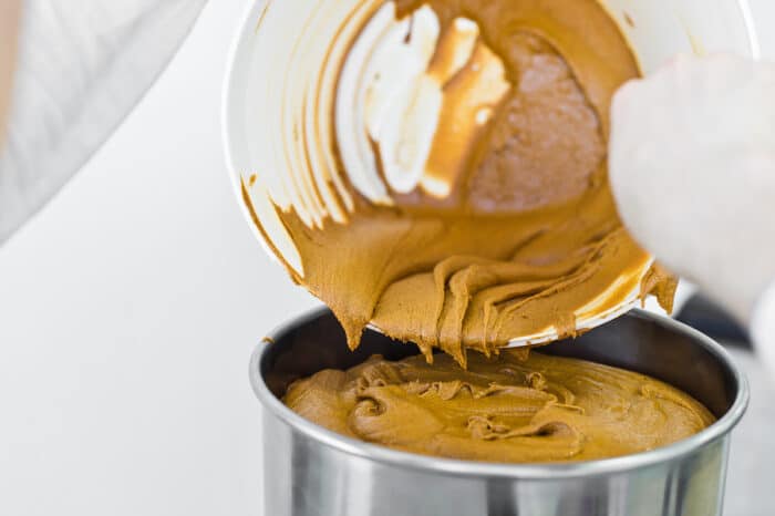 Production working making peanut butter.