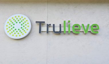 Florida licensed medical marijuana cannabis provider Trulieve name, logo and trademark posted on side of building