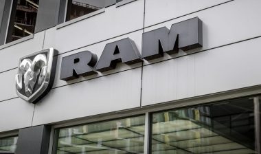 A close-up of the Ram Truck logo sign taken at a local car dealership selling car, trucks and vans.