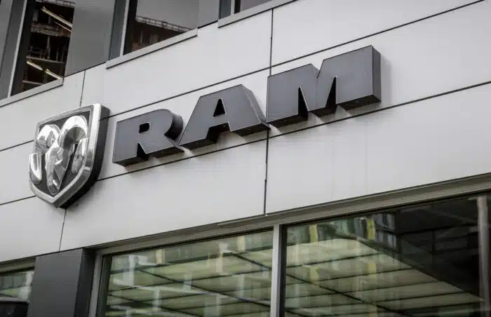 A close-up of the Ram Truck logo sign taken at a local car dealership selling car, trucks and vans.