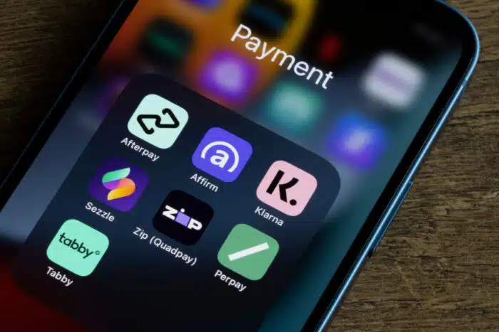 Assorted payment apps offering Buy Now Pay Later services are seen on an iPhone, including Afterpay, Affirm, Klarna, Sezzle, Zip (Quadpay), Perpay, and Tabby.
