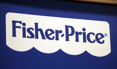 Close up of Fisher-Price logo on a storefront banner.
