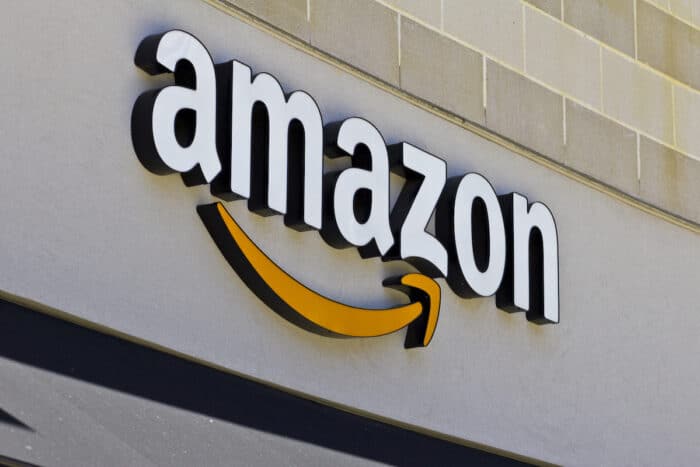 Close up of Amazon sign on exterior of building.