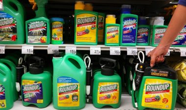 Shelves with a variety of Herbicides in a Carrefour Hypermarket. Roundup is a brand-name of an herbicide containing glyphosate, made by Monsanto Company.