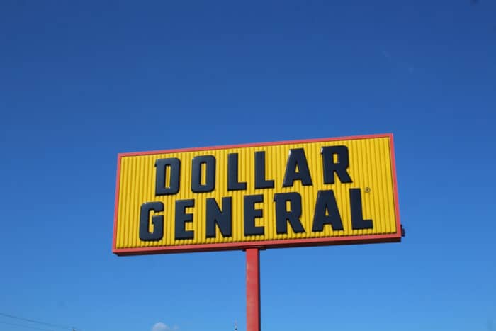 Dollar General sign against a blue sky - class action - lidocaine patch