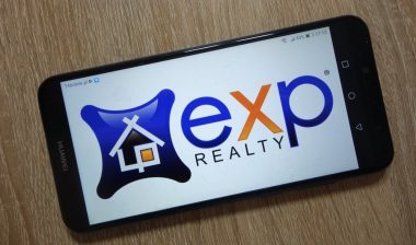 eXp Realty logo displayed on smartphone
