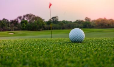 A long putt on the green as sunset closes in; Fairways at Lake Ridge