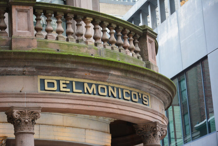 Sign above Delmonico’s Restaurant located.