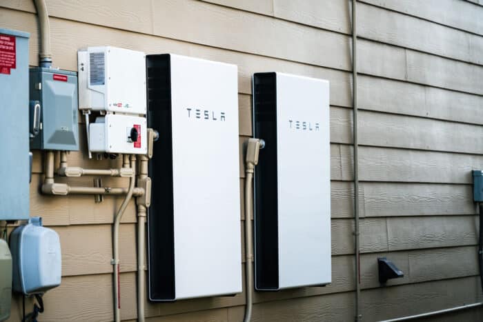 Tesla Powerwall Home battery storage connecting home energy storage with solar panels and powering the grid with a self sustaining future.