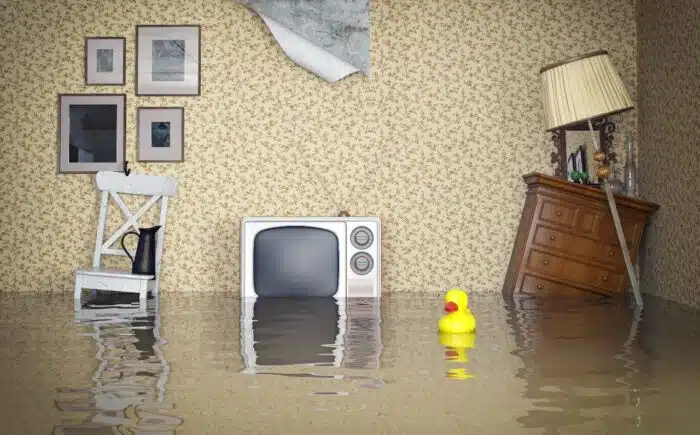Water rises in a flooded home interior - Erie Insurance Co. settlement, class action lawsuit, nonmaterial depreciation