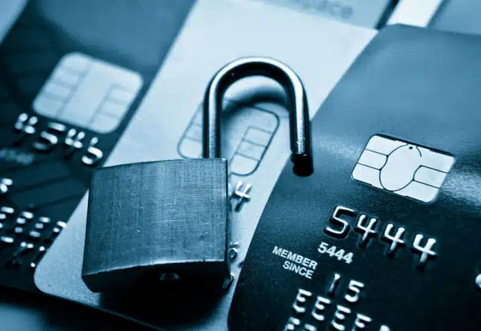 Open lock on top of credit cards. Financial data breach concept - CentralSquare Technologies LLC, click2gov, lawsuit