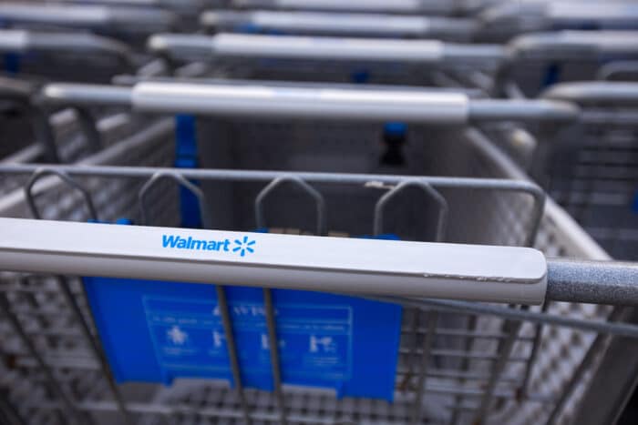 Closeup on shoping cart with "Walmart" on blue handle bar - Oats & Honey Crunchy Granola Bars