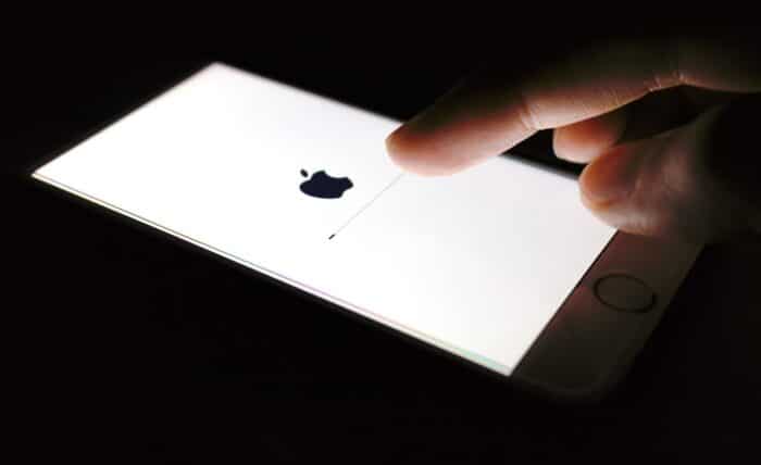 Closeup iphone screen operation software update new version, iphone developed by apple Inc.