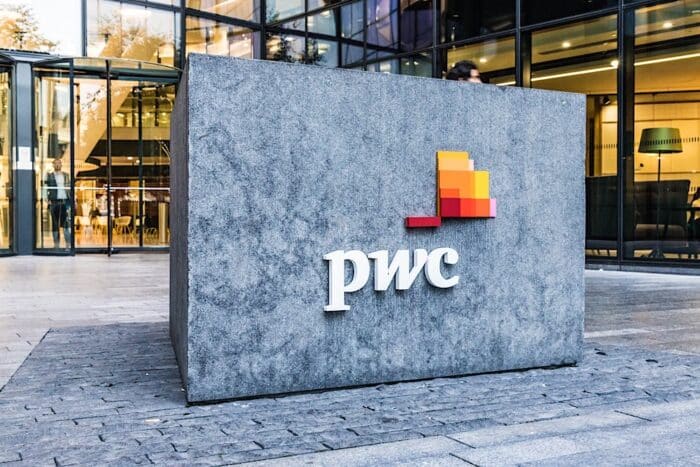 A view of the sign outside the PWC office.