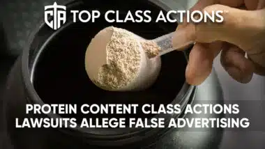 Close up of a protein powder being scooped out of a container.
