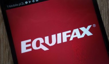 Equifax logo displayed on a modern smartphone.