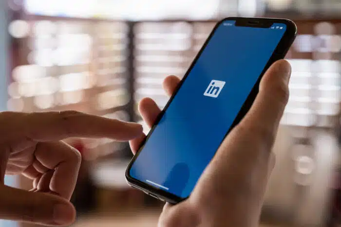 Close up of LinkedIn logo on phone screen.