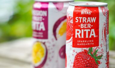 a sweating can can of Straw-Ber-Rita, with a can of Passion-fruit-rita behind. Anheuser-Busch settlement