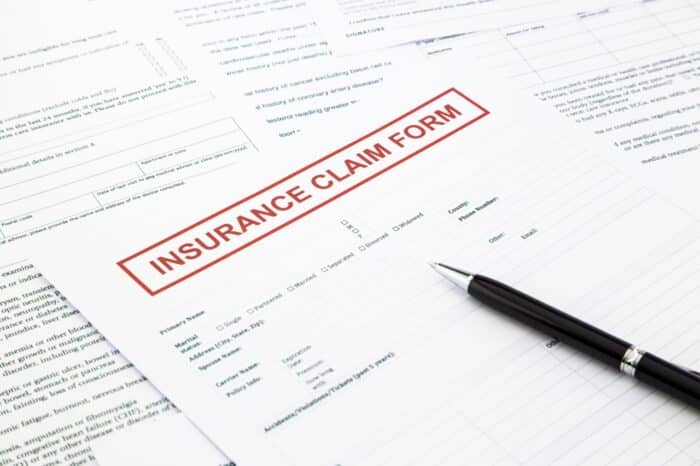 insurance claim form, paperwork and legal document