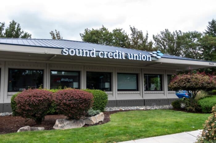 Street view of the entrance to Sound Credit Union on an overcast day.