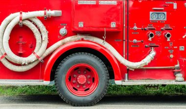 Firefighters truck park beside the road