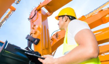 worker controlling construction machinery