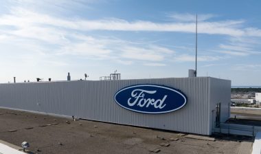 The Ford Motor Company logo is seen atop of their Canada headquarters office building; antitrust settlement