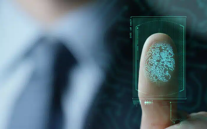 Businessman scan fingerprint biometric identity and approval.