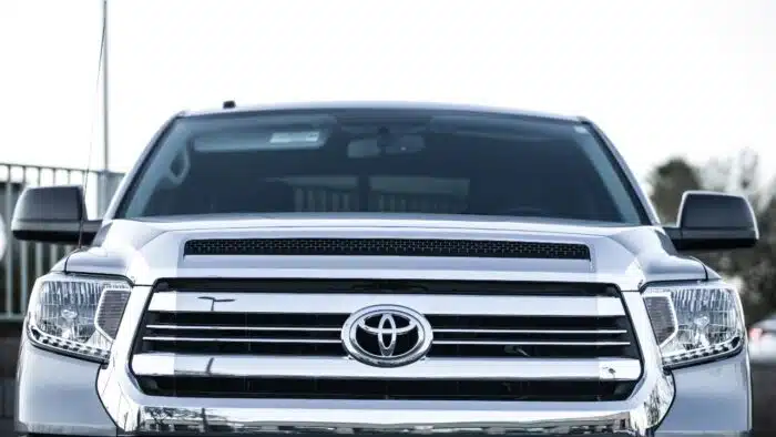 Front view of Toyota Tundra full size pickup truck in metallic grey.